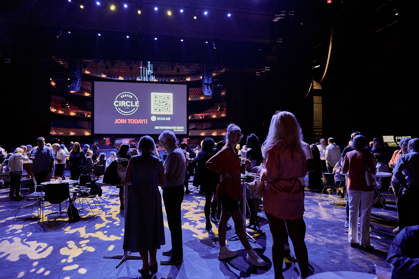 People enjoying a private party at Winspear Opera House in Dallas.
