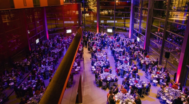 Gala attendees sit at round tables