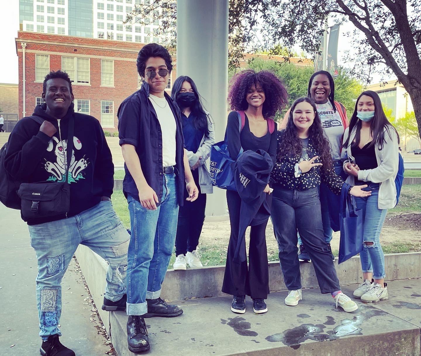 Teen students in a group smiling for a photo