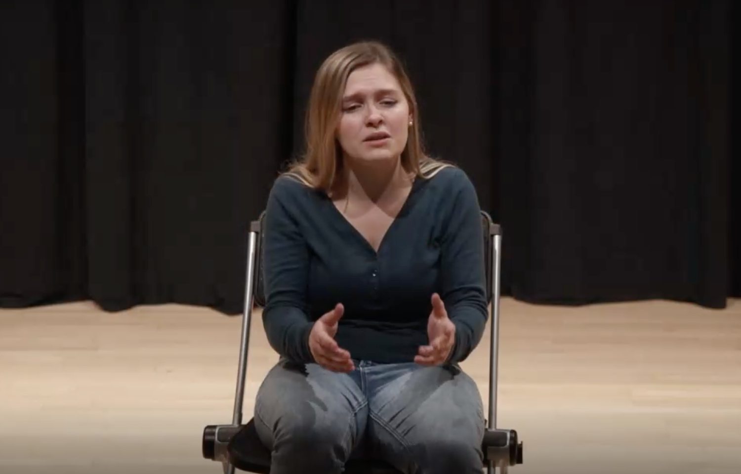 A teen girl performing a monologue